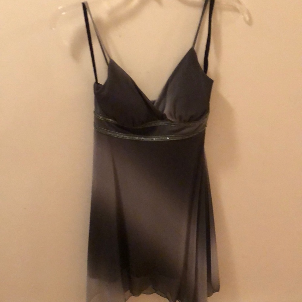 Graduated gray dress with handkerchief bottom.